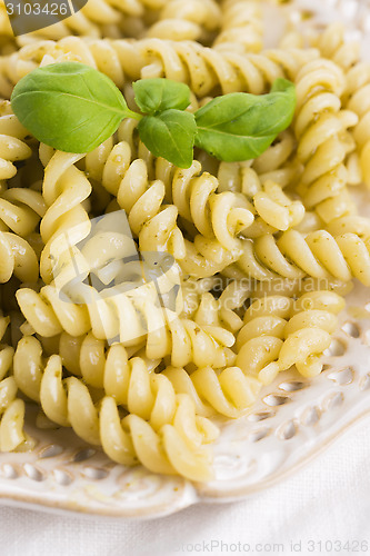Image of italian fusilli pasta and fresh homemade pesto sauce 