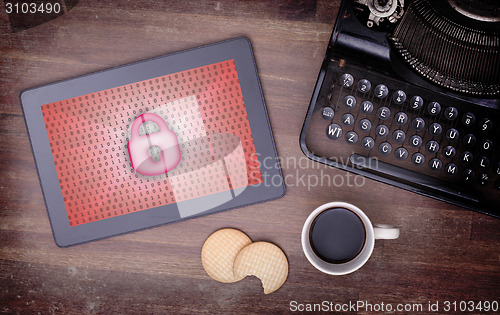 Image of Tablet on a desk, concept of data protection