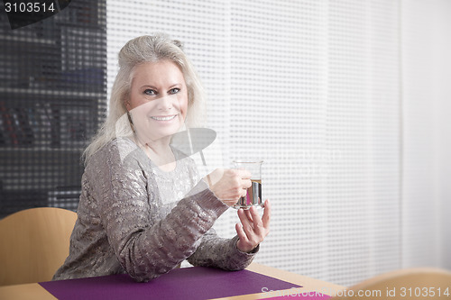 Image of woman and tea