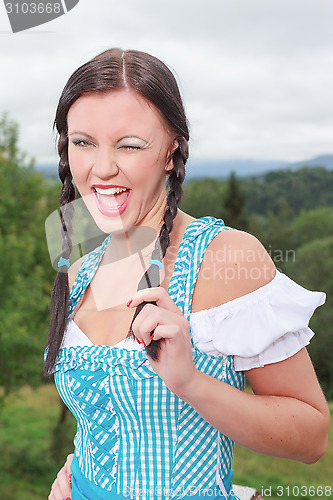 Image of Young girl in dirndl with gaiety