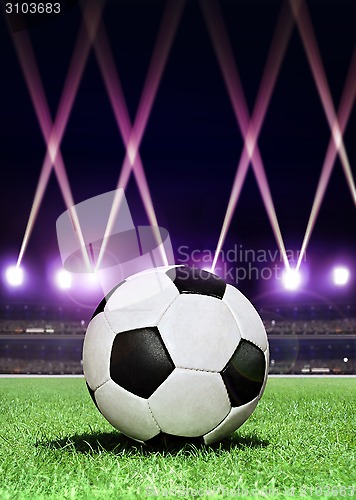 Image of soccerball in festive lighting