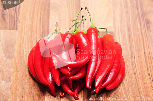 Image of Many stacked red chili successive