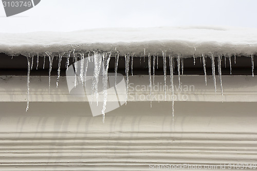 Image of Icicles hanging off a roof