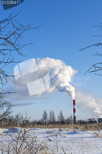 Image of White emissions to atmosphere from power plant chimney