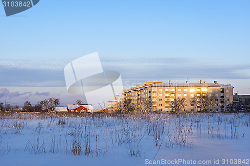 Image of Winter cityscape, modern and old houses