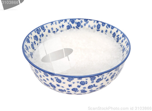 Image of Coarse sea salt in a blue and white china bowl