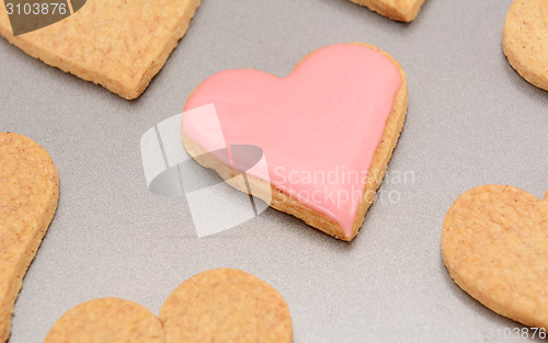 Image of Close-up of an iced heart-shaped biscuit for Valentine's Day