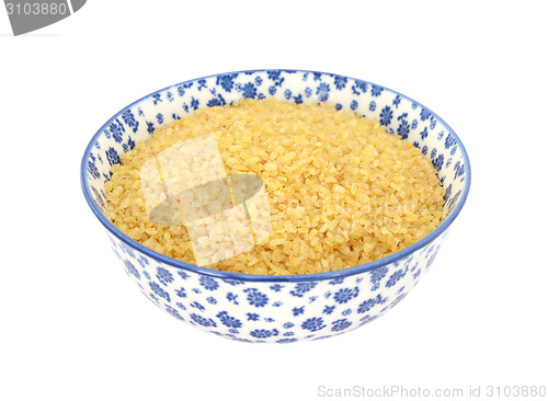 Image of Bulgur wheat in a blue and white china bowl