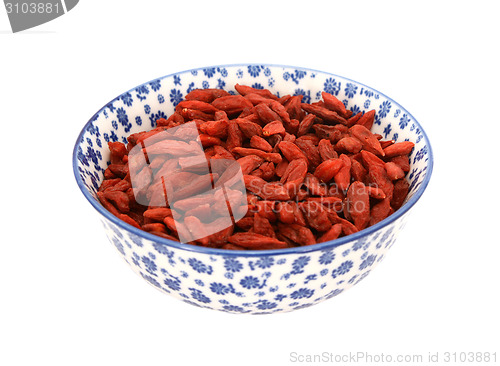 Image of Red goji berries in a blue and white china bowl