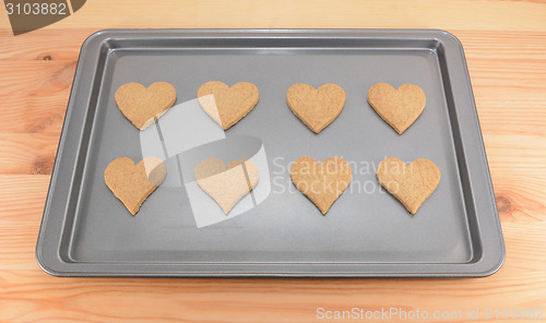 Image of Eight plain heart-shaped cookies