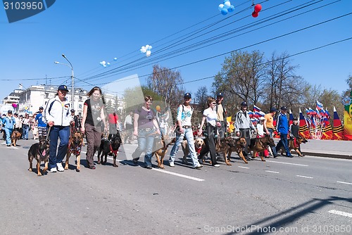 Image of Cynologists from club of dog breeding on parade