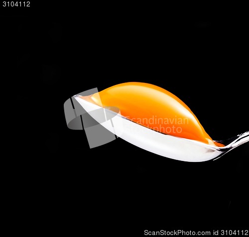 Image of yolk in the spoon