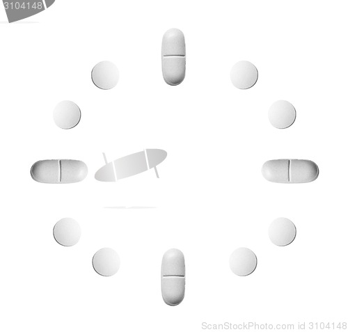 Image of watch made up out of white tablets