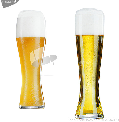 Image of two glasses of beer close-up with froth