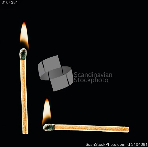 Image of Burning match