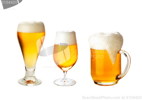 Image of set with different glasses of beer on white