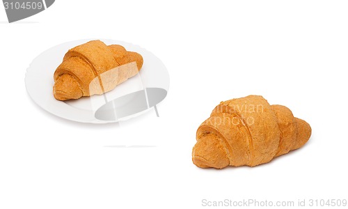 Image of Fresh and tasty croissant over white background
