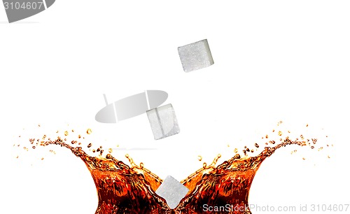 Image of Tea splash with sugar cubes