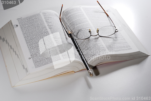 Image of open book on a table