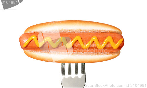 Image of Close up of sausage and fork isolated on white background