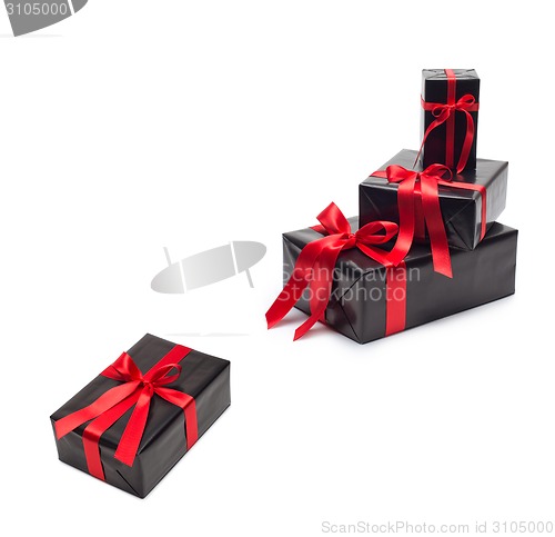 Image of Black gift box with red satin ribbon and bow