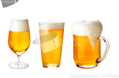 Image of set with different glasses of beer on white