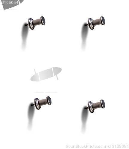 Image of grey metal pushpin set isolated
