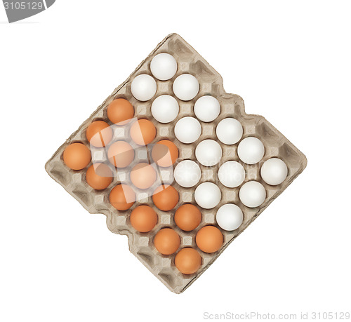 Image of twenty four of white and brown eggs in the box