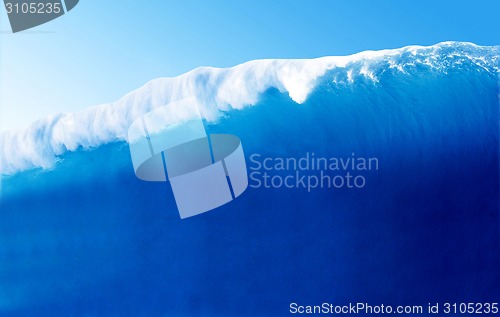 Image of Large Blue Surfing Wave