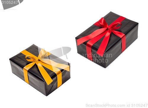 Image of two gift boxes with yellow and red satin ribbon
