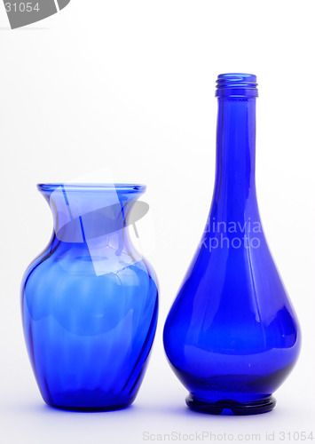 Image of Blue vase and oil bottle