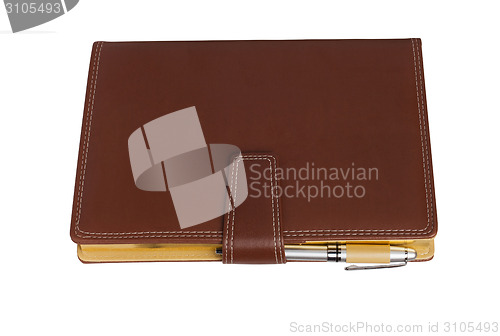 Image of Leather notebook and pencil on white background.