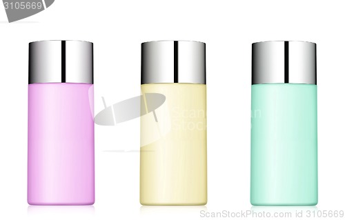 Image of close up of a three bottles on white background