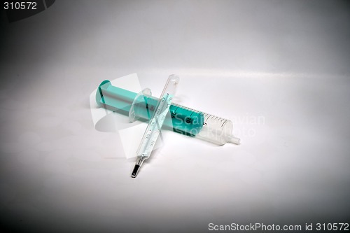 Image of Thermometer and Syringe