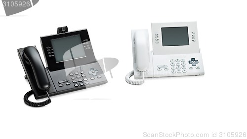Image of Two Office IP telephones set with LCD display isolated on white
