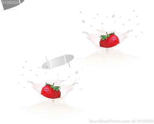 Image of Strawberry falling into milk