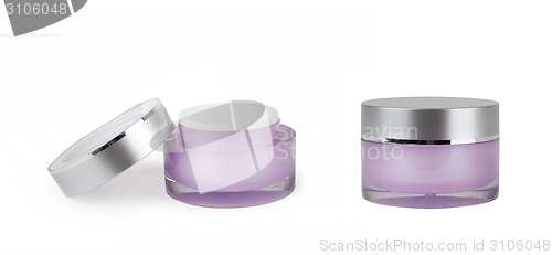 Image of two purple containers of cream on white background