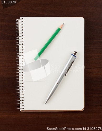 Image of pen and blank paper