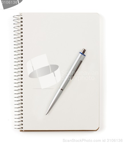 Image of Note book with pen isolated on white