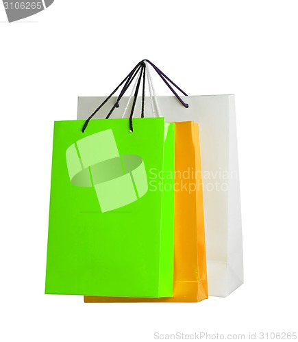 Image of Assorted colored shopping bags on white