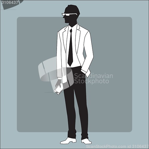 Image of Modern businessman with a gadget in his hand