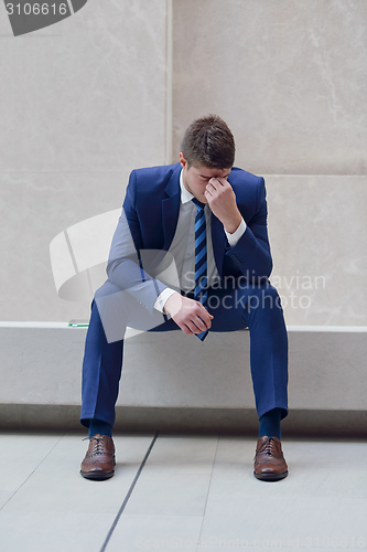 Image of frustrated young business man