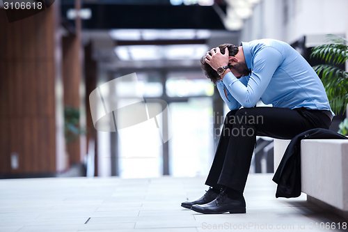 Image of frustrated young business man