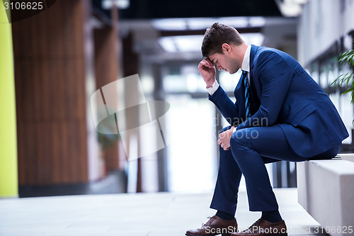 Image of frustrated young business man