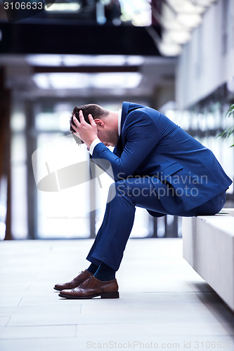 Image of frustrated young business man