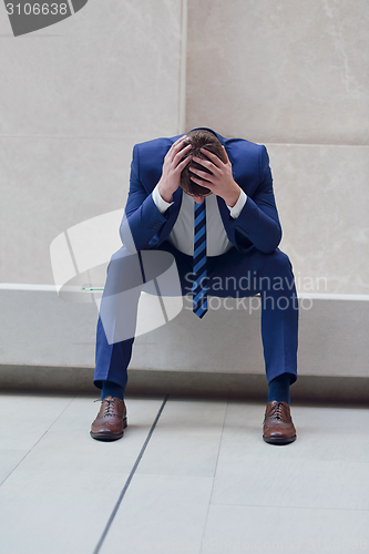 Image of frustrated young business man