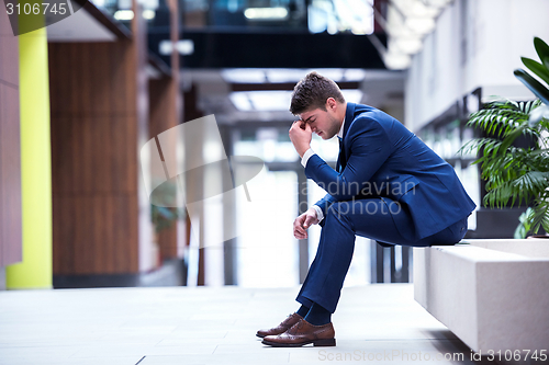 Image of frustrated young business man