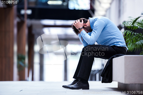 Image of frustrated young business man