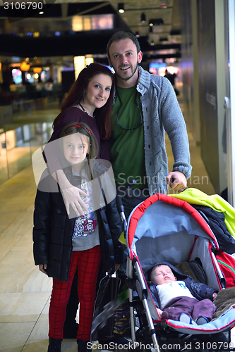 Image of family in shopping mall
