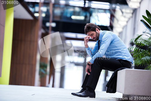 Image of frustrated young business man